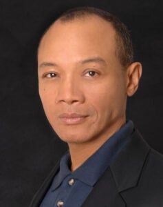 Acting headshots guide: Actor Paul Calderon demonstrating dramatic theatrical range with strong eye connection.